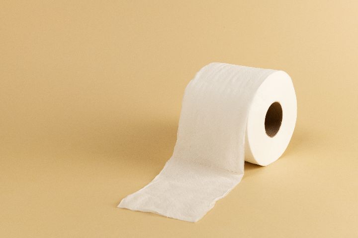 toilet roll on yellow background