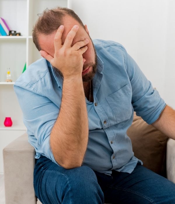 Man experiencing stress linked to urinary incontinence