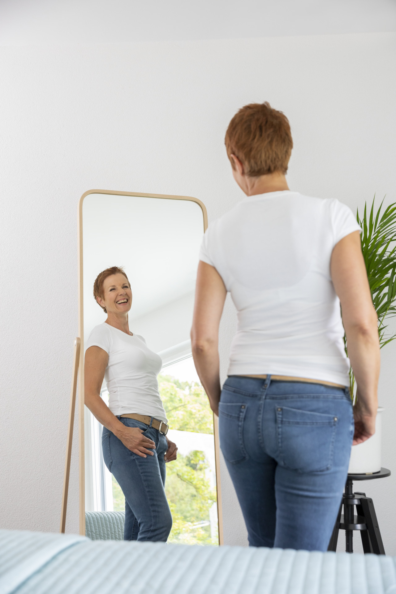 Woman looking in the mirror