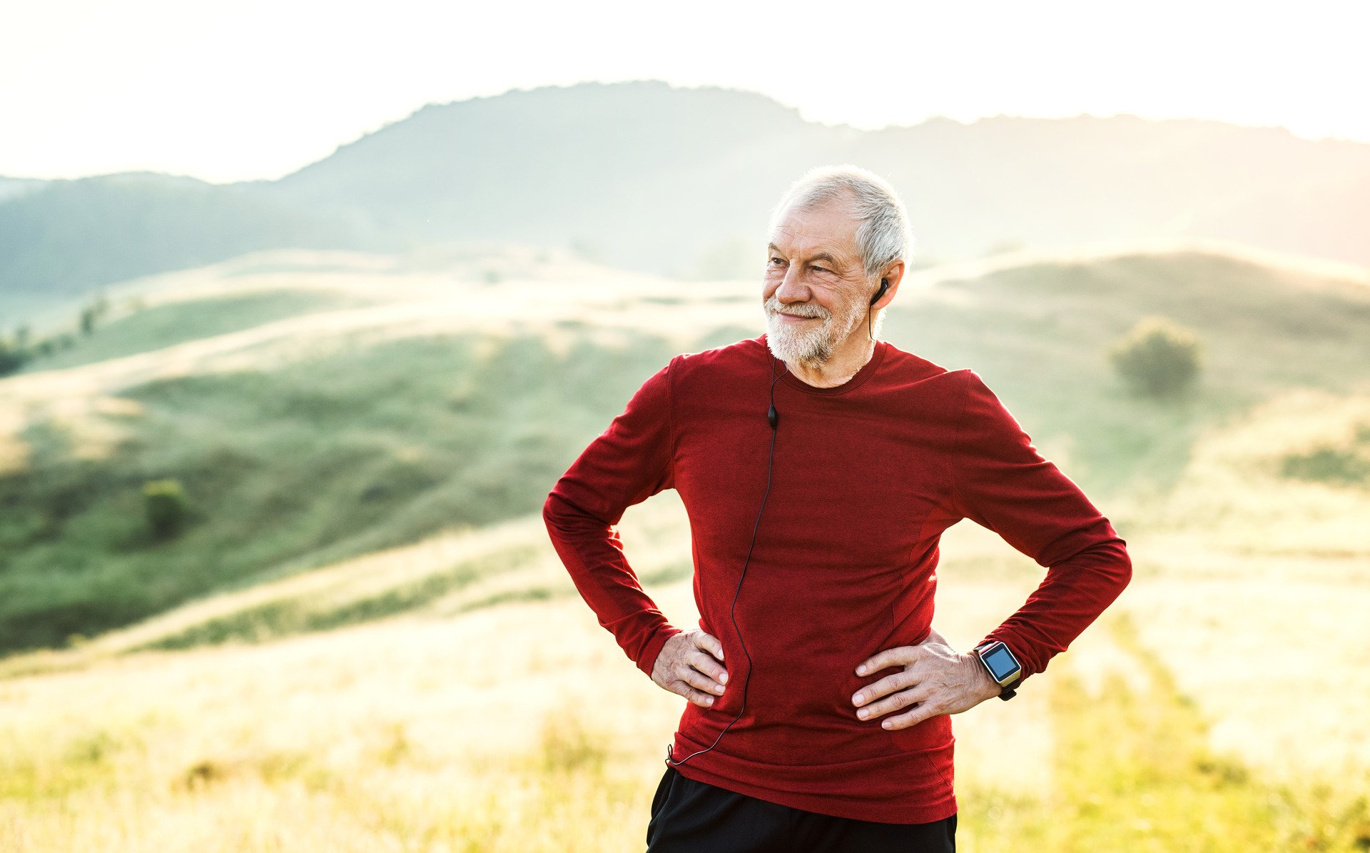 Man With His Hands On His Hips On A Hill